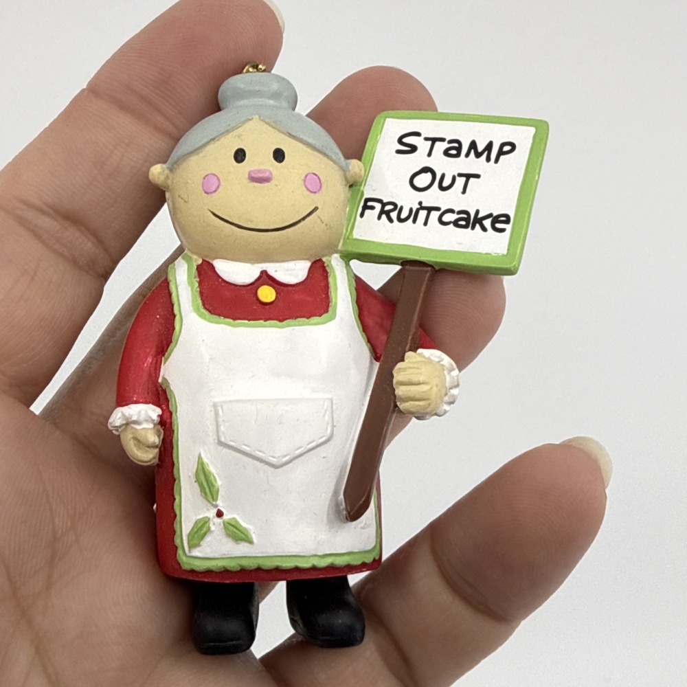 Stamp Out Fruitcake Vtg Christmas Ornament - Our Name Is Mud Mrs‎ Claus Activist